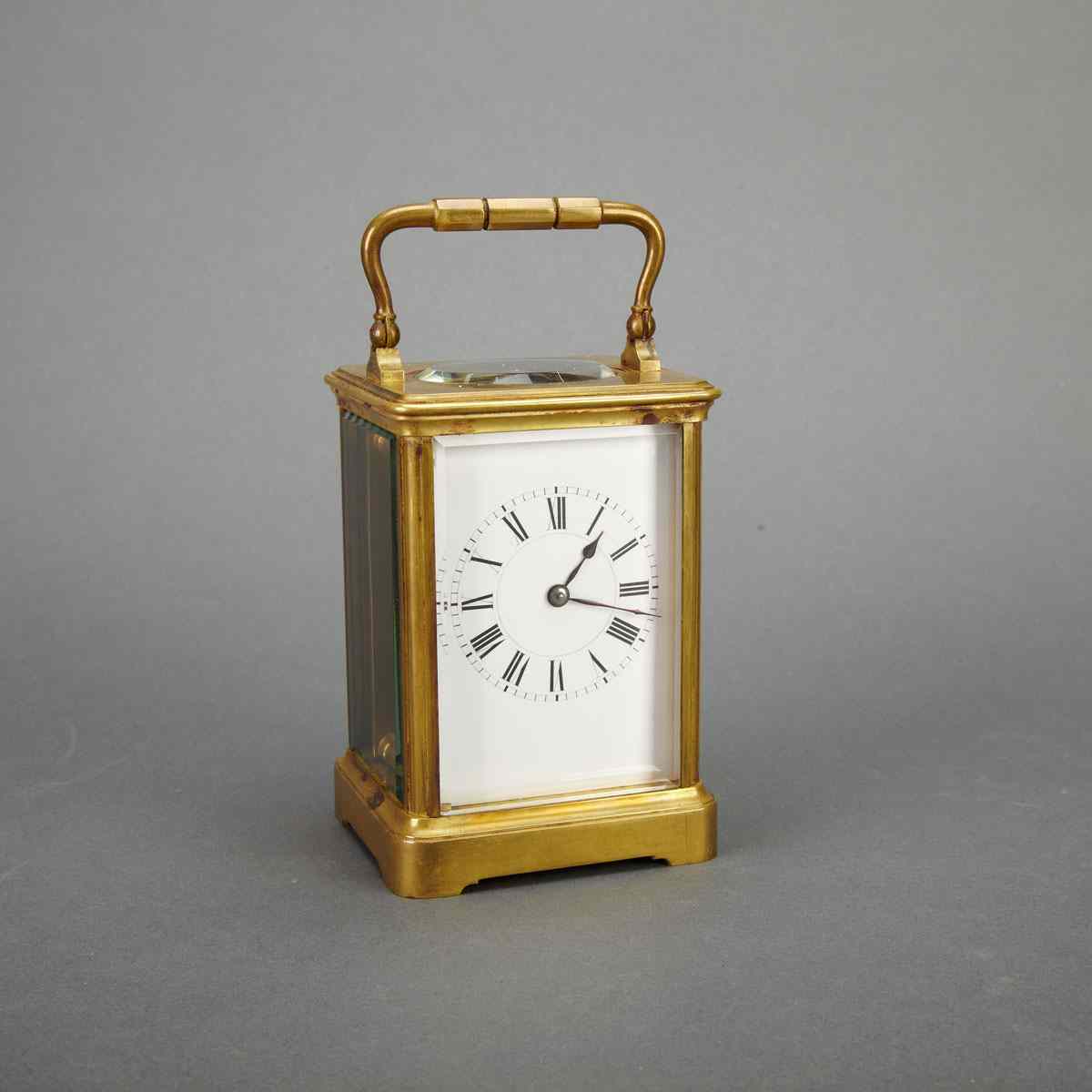 Appraisal: French Gilt Bronze Carriage Clock early th century with key