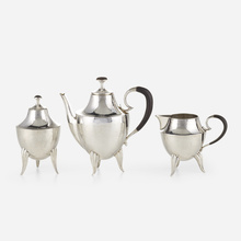 Appraisal: Josef Hoffmann THREE-PIECE TEA SERVICE Wiener Werkst tteAustria c hand-hammered