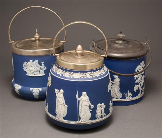 Appraisal: Three Wedgwood blue and white jasperware biscuit jars late th