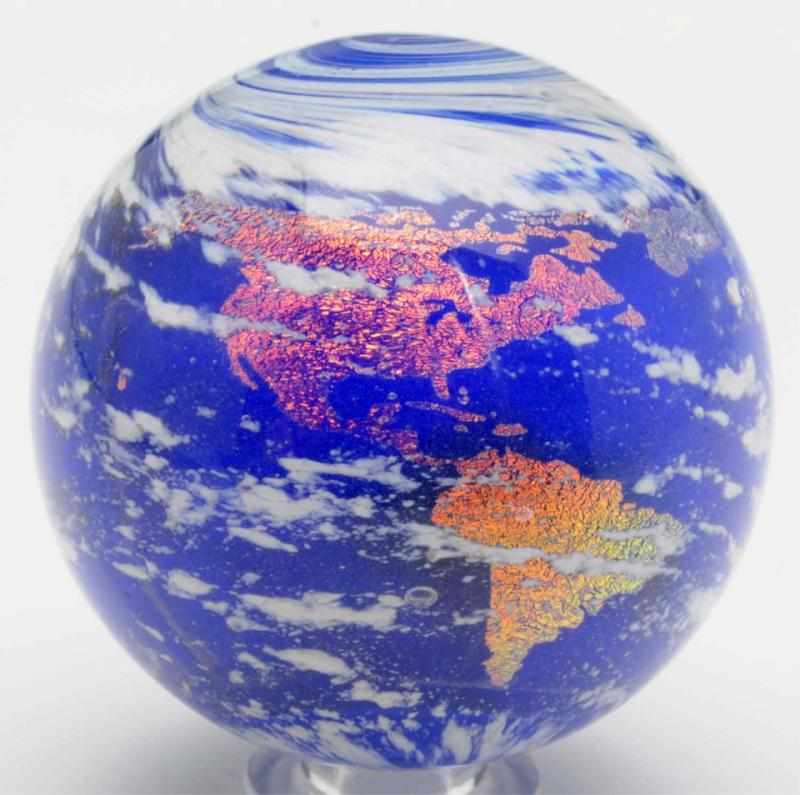 Appraisal: Geoffrey Beetem Contemporary Marble Earth sphere marble with nice blue