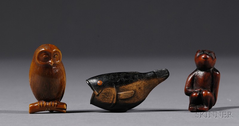 Appraisal: Three Netsuke a monkey an owl and a fish