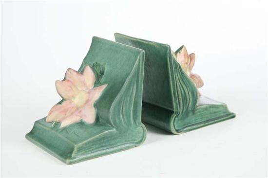 Appraisal: PAIR OF ROSEVILLE BOOKENDS In the form of open books