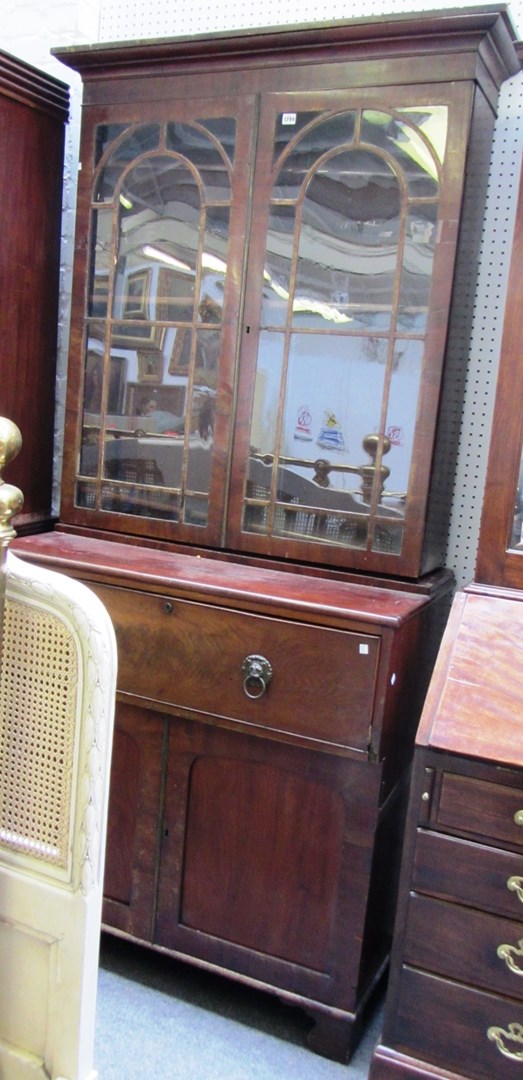 Appraisal: A th century mahogany secretaire bookcase with pair of glazed