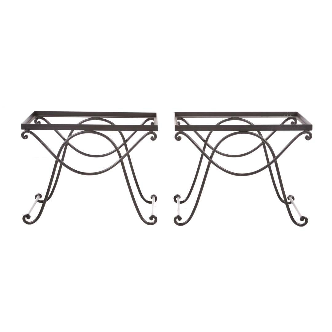 Appraisal: Pair of contemporary wrought iron side tables th century scrolled