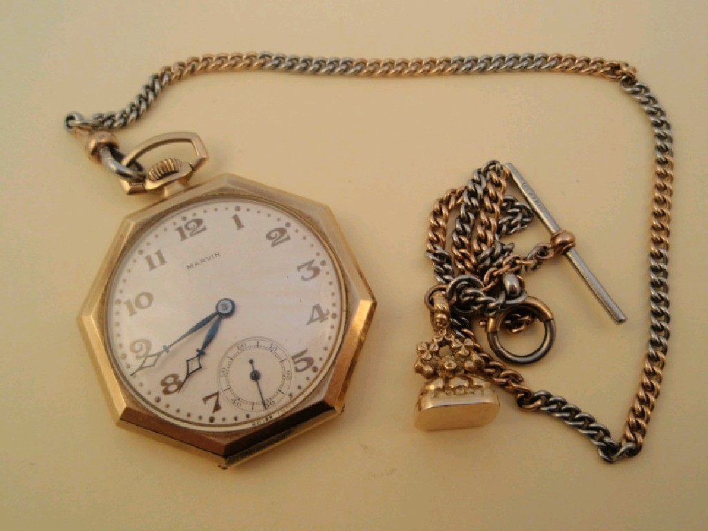 Appraisal: An octagonal gold cased open face dress pocket watch by