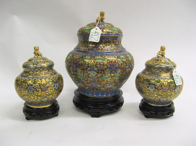 Appraisal: THREE CHINESE OPENWORK CLOISONNE COVERED VASES includes one larger vase