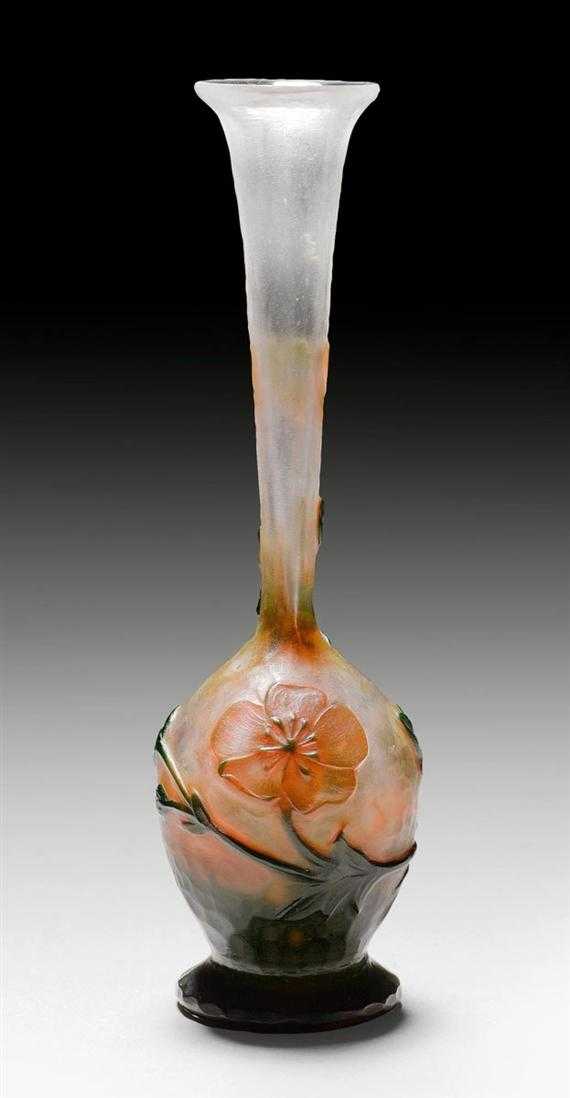 Appraisal: DAUM NANCY BUD VASE circa Mould-etched white glass with orange