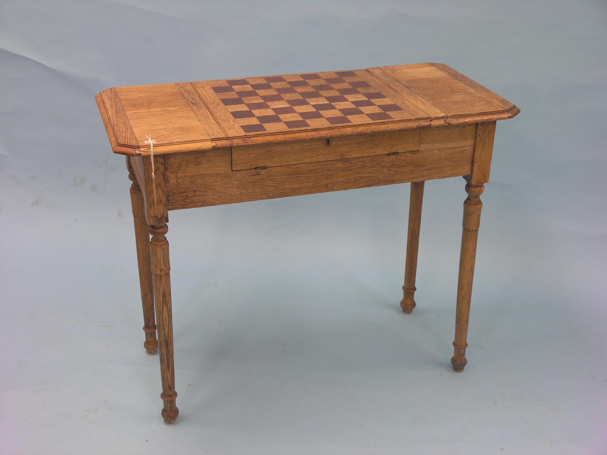 Appraisal: An unusual early th century oak desk with hinged and