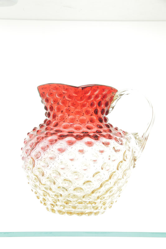 Appraisal: ART GLASS PITCHER Attributed to Hobbs Rubina pitcher with diamond