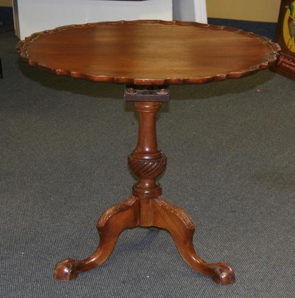 Appraisal: Mahogany birdcage tilt top table pie crust edge claw and