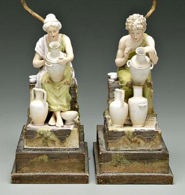 Appraisal: Pair porcelain lamp bases porcelain figures of classical potters decorating