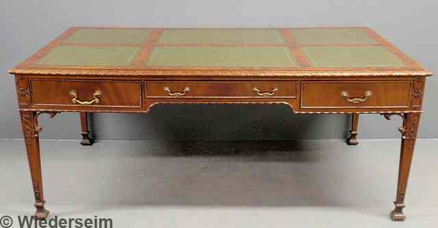 Appraisal: Ornately carved mahogany partners desk early th c with a