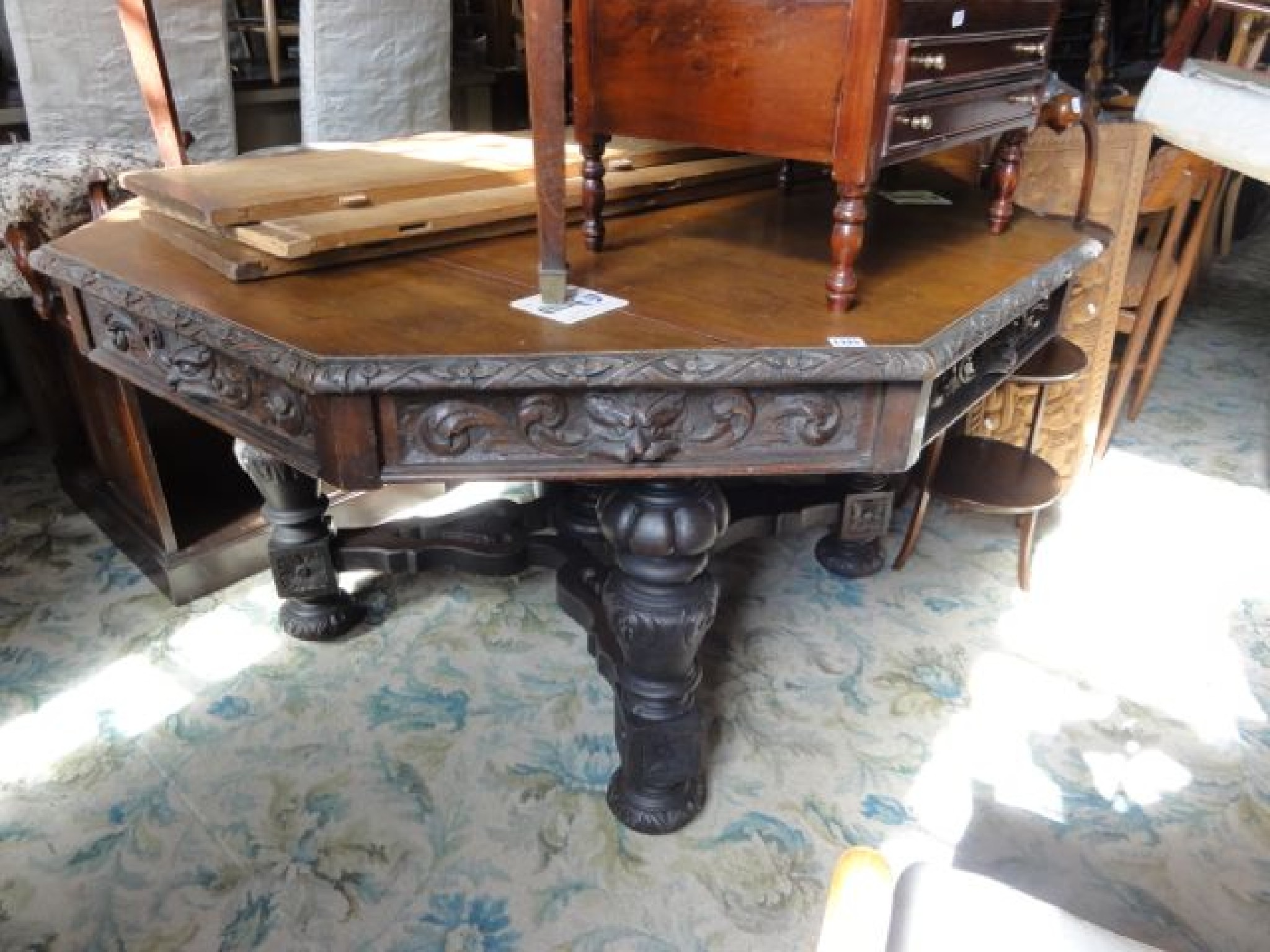 Appraisal: A Victorian oak library centre table of octagonal form with