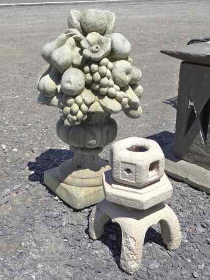 Appraisal: Stone flower ornament along with a stone pagoda as found