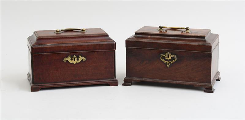 Appraisal: TWO SIMILAR GEORGE III MAHOGANY TEA CADDIES Each flat domed