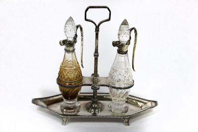 Appraisal: A silver mounted oil and vinegar set Haseler Bros London