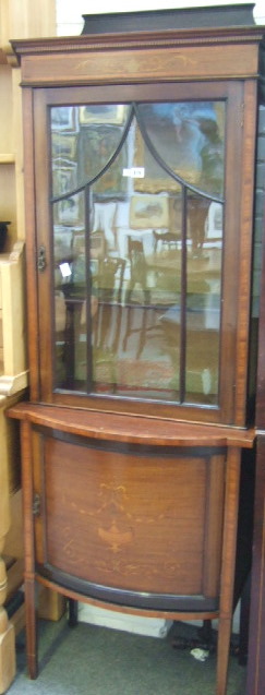 Appraisal: An Edwardian mahogany satinwood banded and marquetry inlaid display cabinet