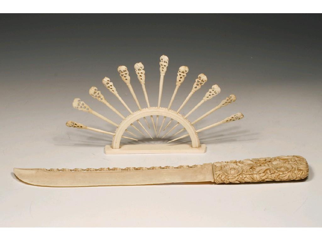 Appraisal: A CARVED INDIAN IVORY PAPER KNIFE with floral decorated handle