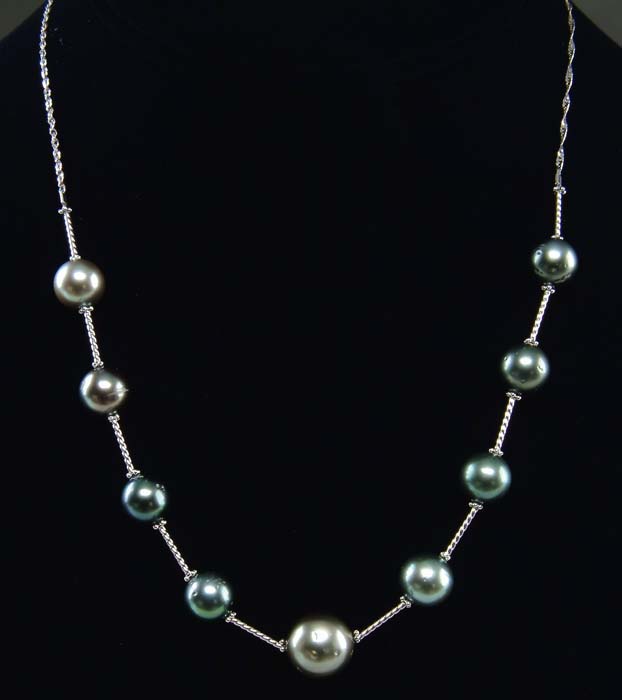 Appraisal: TAHITIAN PEARL NECKLACE kt white gold necklace has nine black-silver