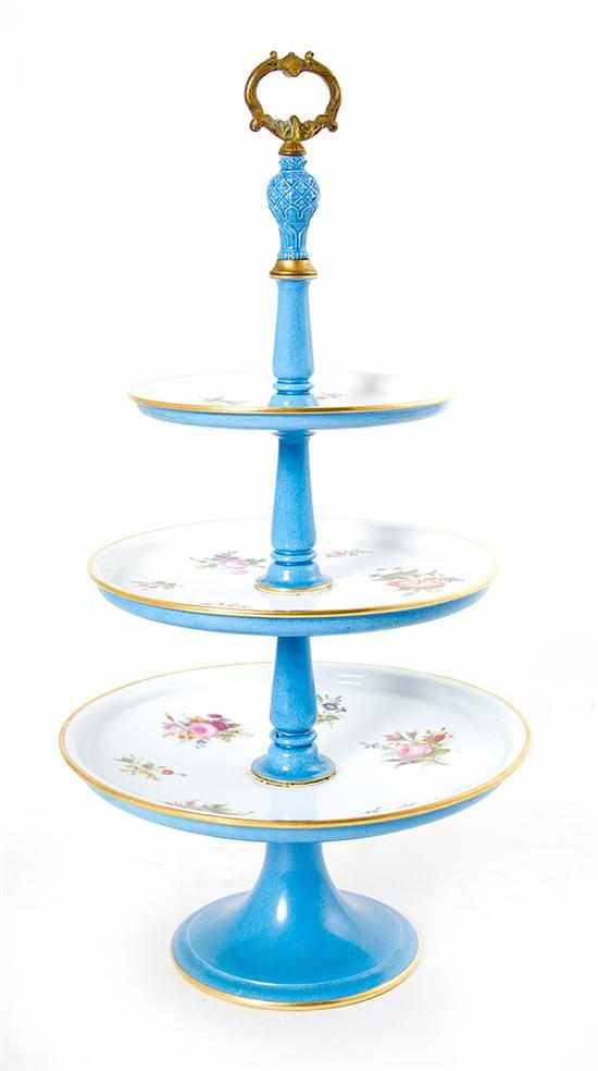 Appraisal: Sevres style porcelain three-tier dessert stand th century ormolu handle