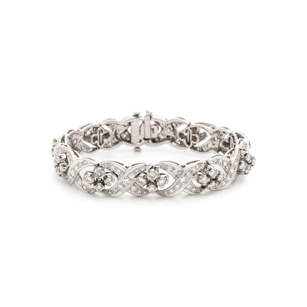 Appraisal: DIAMOND BRACELET DIAMOND BRACELET Containing numerous round brilliant cut diamonds