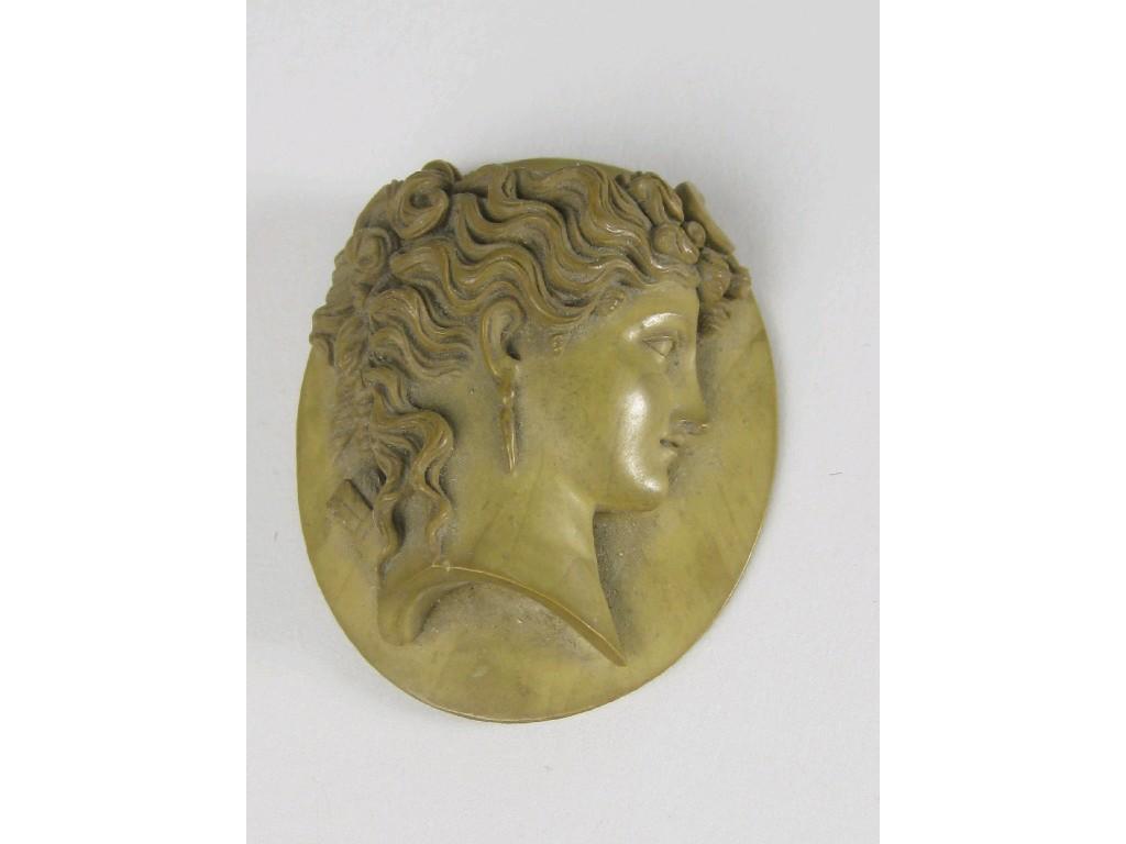 Appraisal: A carved lava Cameo with high relief profile portrait of