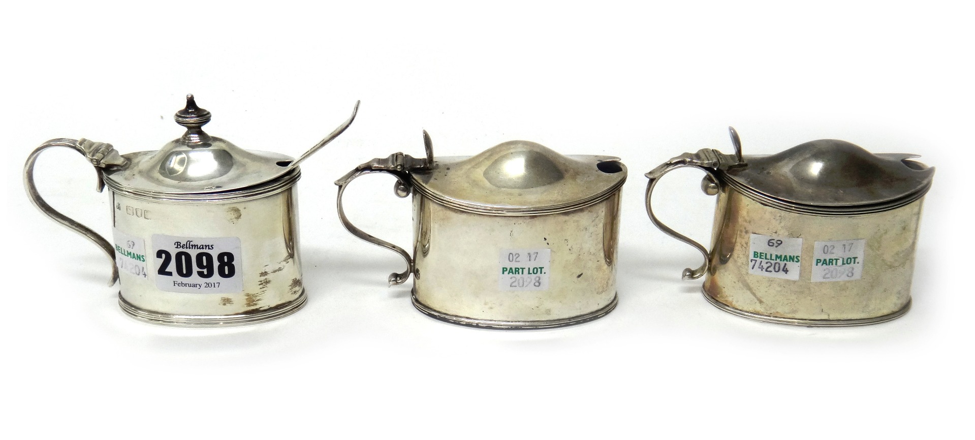 Appraisal: A late Victorian silver oval mustard pot with a silver