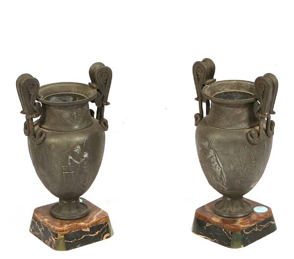 Appraisal: A pair of French patinated metal urns circa on marble