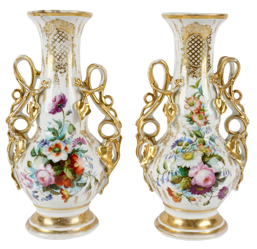 Appraisal: PAIR OF CONTINENTAL GILT PORCELAIN VASESunmarked drilled each hand-painted with