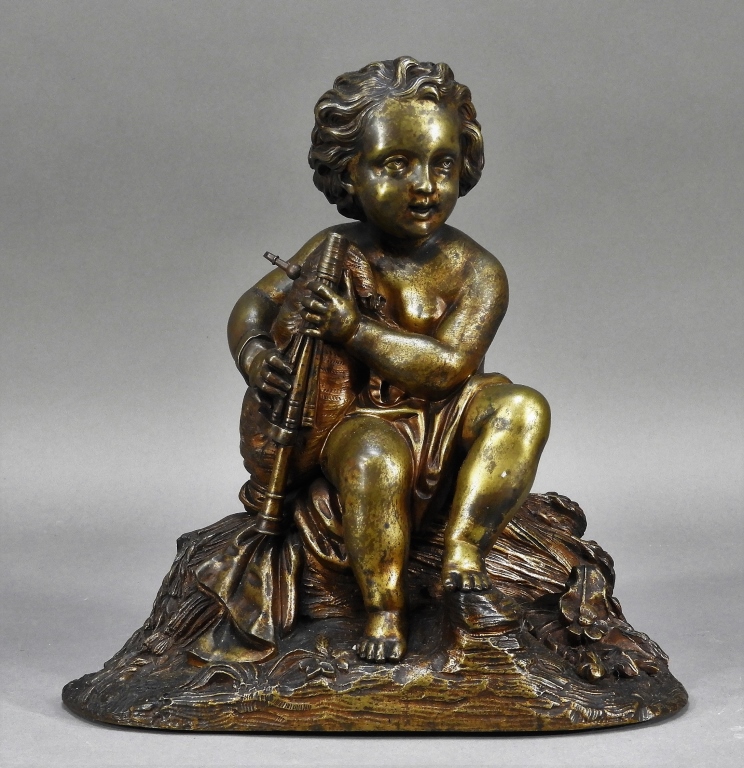 Appraisal: C FRENCH ORMOLU BRONZE MODEL OF A MUSICAL PUTTI France