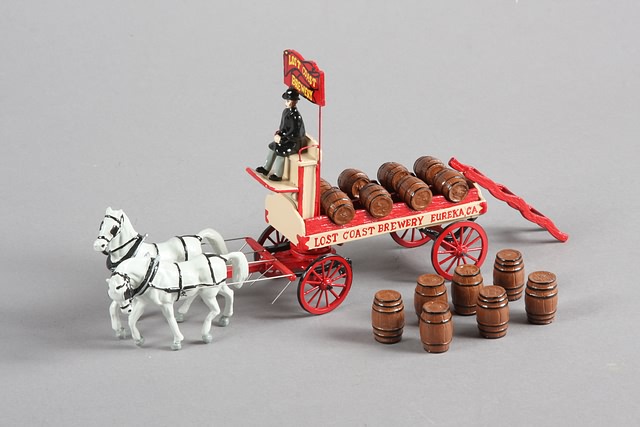 Appraisal: One metal Horse Drawn Beer Wagon by Northcoast Miniatures with