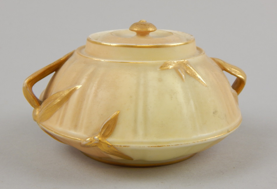 Appraisal: A Victorian Royal Worcester blush ivory two handled pot pourri