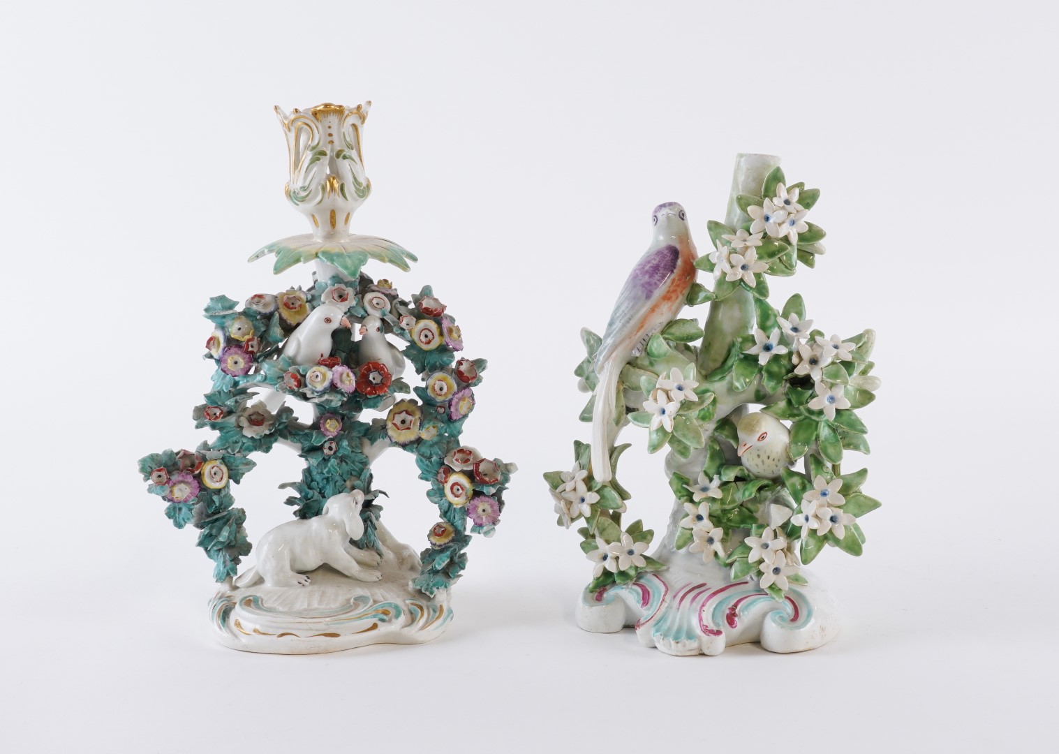 Appraisal: TWO DERBY BIRDS IN BRANCHES' CANDLESTICKS Circa One modelled as