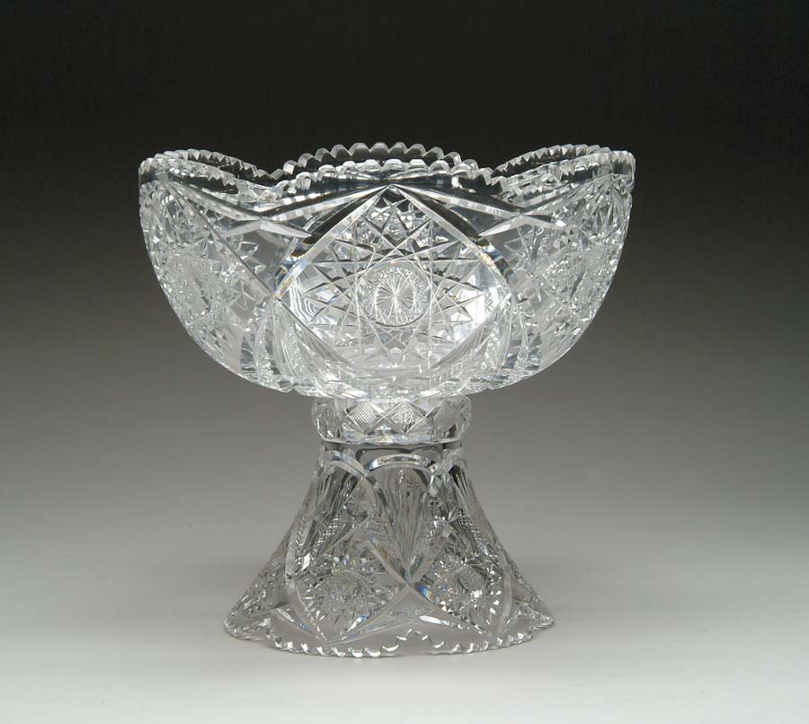 Appraisal: TWO PIECE CUT GLASS PUNCHBOWL LADLE Lovely punchbowl is cut