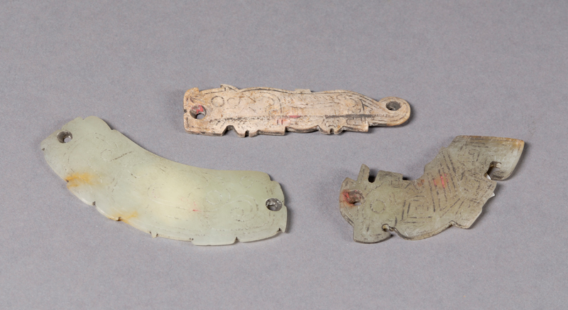 Appraisal: Three Archaic-style Jade Pendants carvings of a tiger and two