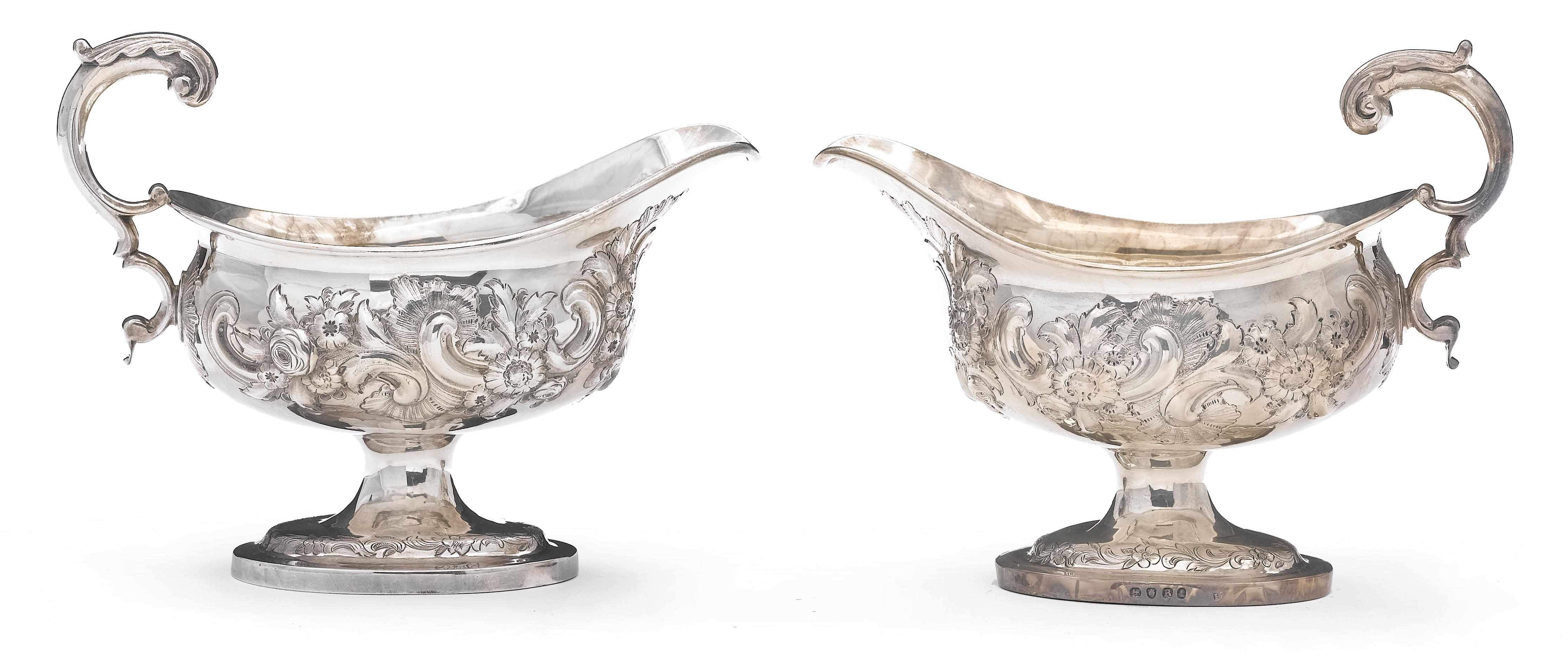 Appraisal: A Regency silver pair of pedestal base sauce boats later