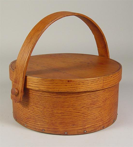 Appraisal: Round Wood Pantry Box th Century With wooden bail handle