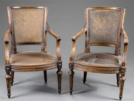 Appraisal: Pair of Louis XVI style French caned back armchairs th