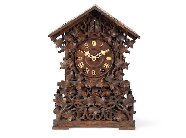 Appraisal: An early th century Black Forest cuckoo clock in original