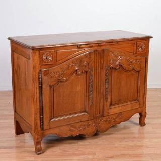 Appraisal: Louis XV provincial carved fruitwood buffet th c arched paneled