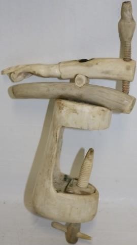 Appraisal: TH C PRISONER-OF-WAR BONE SEWING CLAMP WITHINTERESTING CARVED HAND HIGH