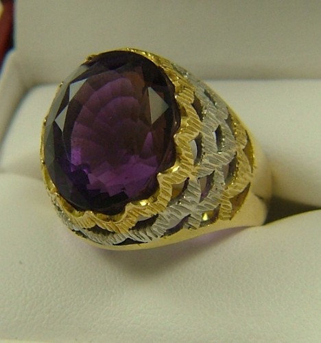 Appraisal: AMETHYST SOLITAIRE RING K yellow and white gold centering an