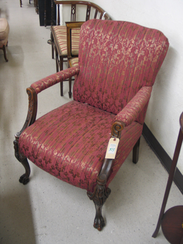 Appraisal: A CARVED AND UPHOLSTERED MAHOGANY ARMCHAIR American early th century