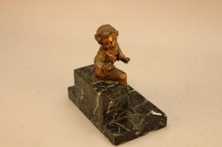 Appraisal: Antique French Bronze Seated Cherub Bookend Height in