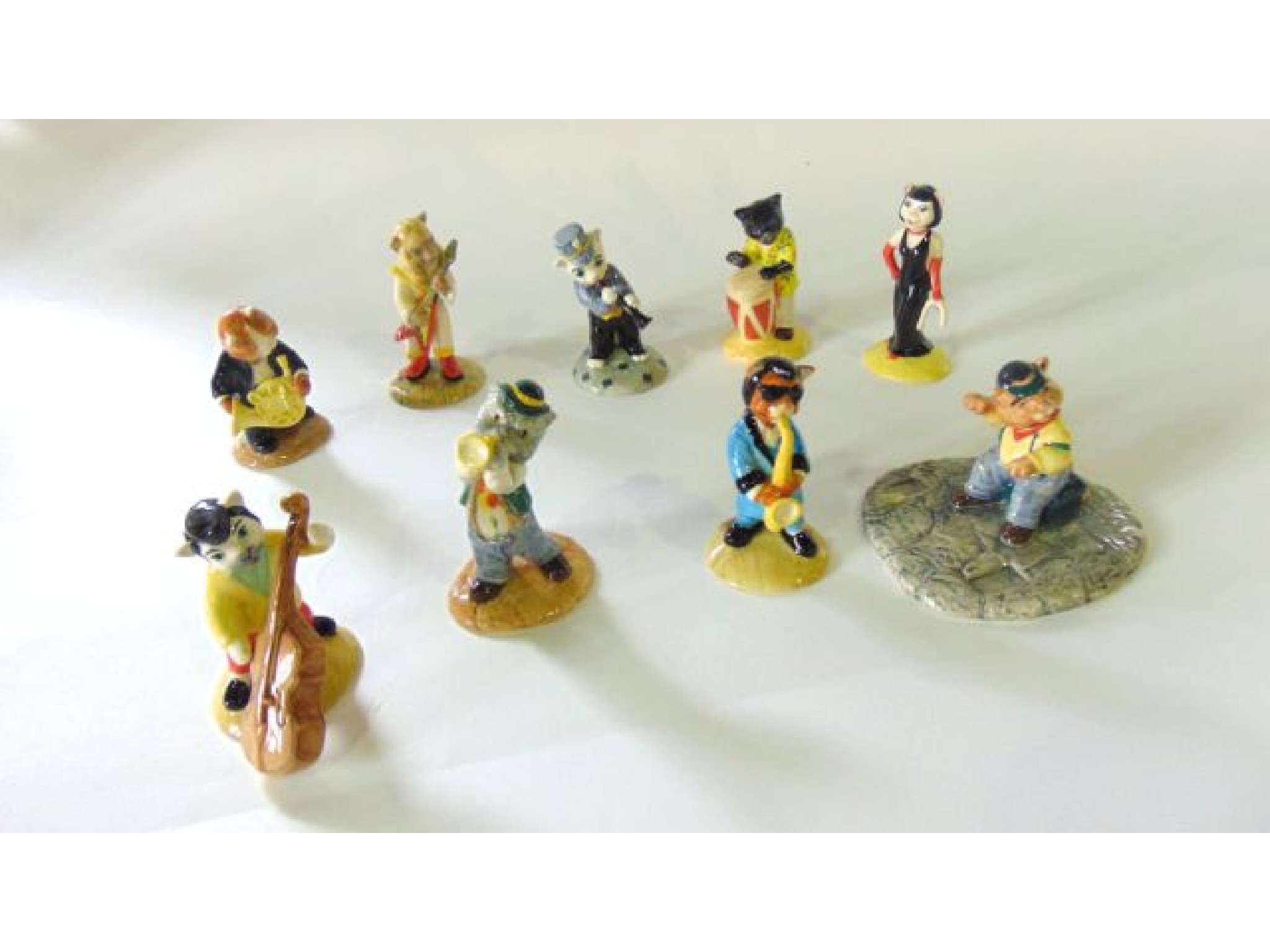 Appraisal: A collection of Beswick cat musicians - Fat Cat CC