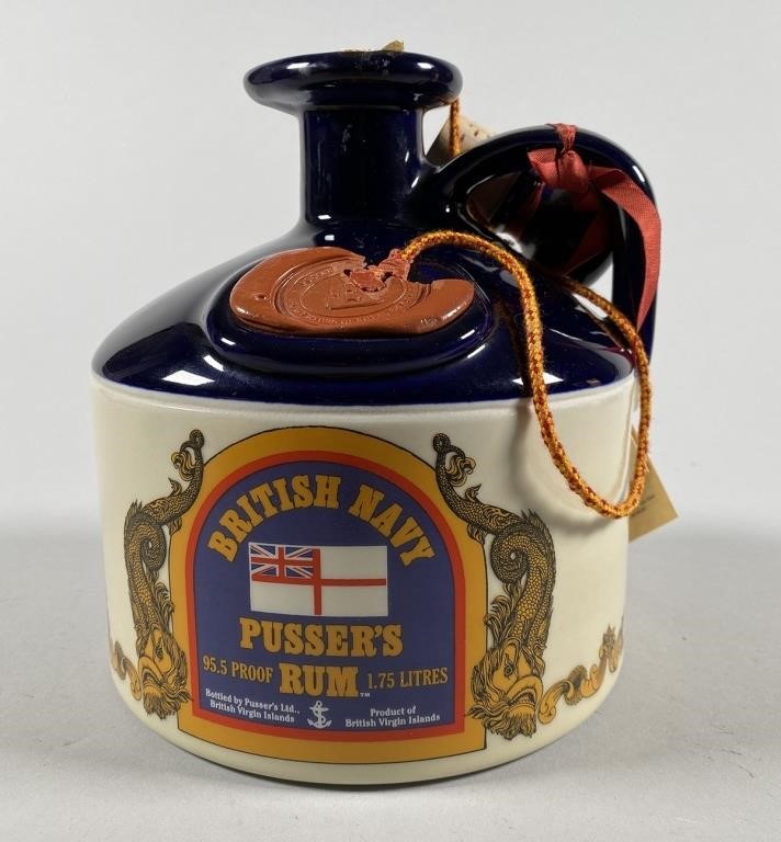 Appraisal: Vintage sealed bottle of British Navy Pusser's Rum in stone