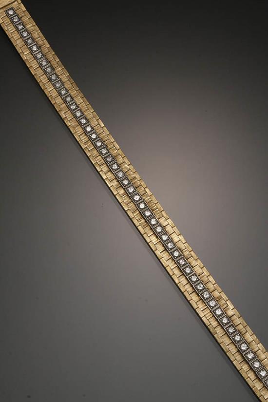 Appraisal: -Karat Yellow-Gold and Diamond Bracelet Cartier The flexible florentine finish