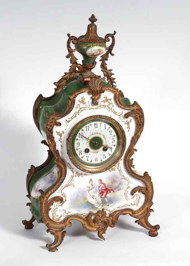 Appraisal: FRENCH PORCELAIN AND ORMOLU MANTLE CLOCK Asymmetrical hand painted decorated