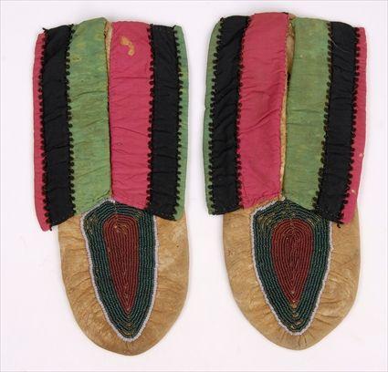 Appraisal: PAIR OF EASTERN WOODLANDS DELAWARE MOCCASINS x in See Pleasing