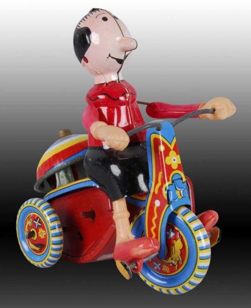 Appraisal: Linemar Olive Oyl Mechanical Tricycle Toy Description Original box Marked